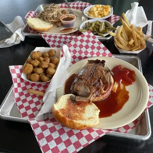 Pulled pork with green beans and mac&amp;cheeze. Bbq brisket with fries and fried ocre