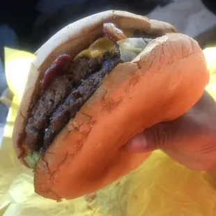 This burger makes my hand little