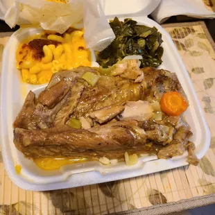 a meal in a styrofoam container