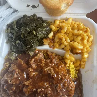 Cube steak, Collard Greens, Macaroni and Cheese, and Yellow Rice.