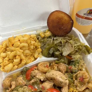 Chicken &amp; shrimp over yellow rice Mac &amp; cheese, cabbage, roll  Mango Lemonade