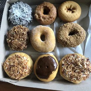 German chocolate, coconut creme, butterscotch, creme filled, pumpkin, plain, and sugar donuts