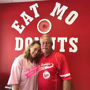 a man and woman posing for a picture