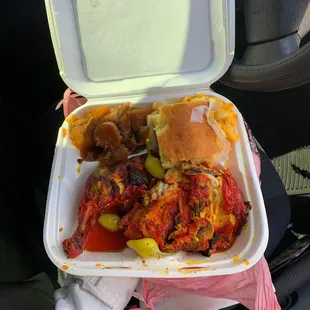 Half chicken, yams, Mac n cheese, and cornbread