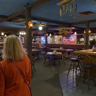 Big oyster bar &amp; bar at counter/ big open restaurant seating