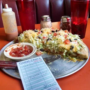 Medium Mexican pizza, hot sauce, salsa, and two sodas for about $25 bucks.