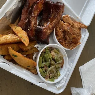 1/3 rack ribs + pulled chicken combo.  Parsley potatoes and green beans