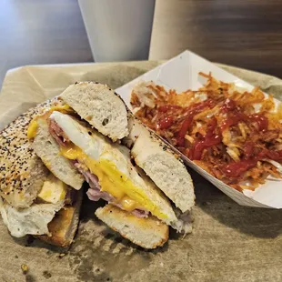 Ham egg and cheese on an everything bagel, plus a side of hashbrowns #yum #ReviewsByRL