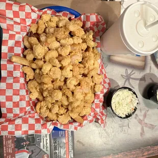 Popcorn shrimp meal with side slaw and drink