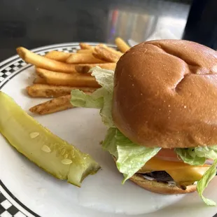 Cheeseburger, fries and pickle