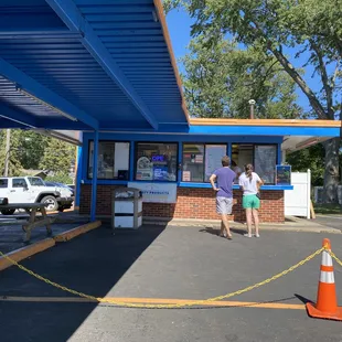 two people standing in front of a big dip