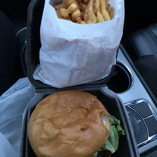 Single cheeseburger and Cajun waffle fries