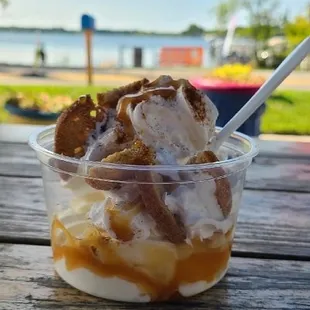 Apple Cider infused sundae with donut crisps, topped with caramel, whipped cream and cinnamon.