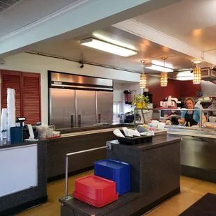 a woman in a restaurant kitchen