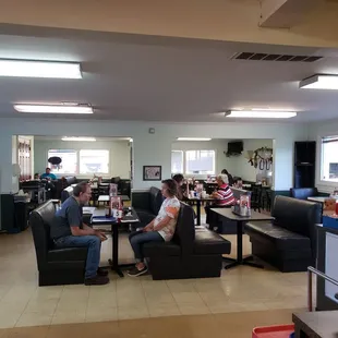 a group of people sitting in a room