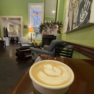 a cup of coffee on a table