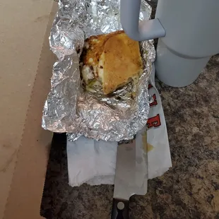 The Best mushroom steak sandwich with my bite out of it wanting more as my 8 yr old took it and my 12 yr old took the other half...