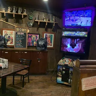a bar with tables and chairs