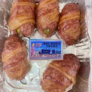 Smoked on our pit... Jalapeños stuffed with cream cheese wrapped in seasoned beef wrapped with bacon.
