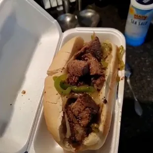 Burnt end philly cheesesteak sandwich