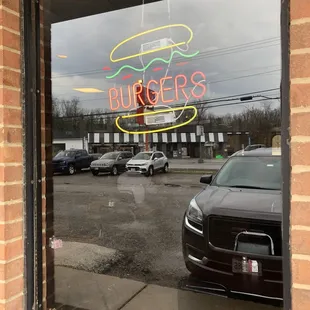 the reflection of a car in the window