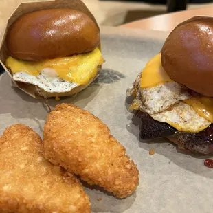 two burgers and a fried egg