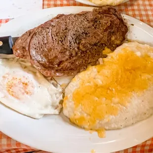 Steak and egg breakfast. With cheese grits