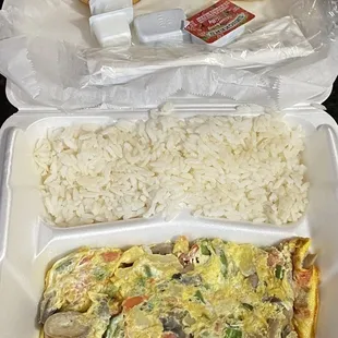 Vegetable omelet with buttered rice and biscuits