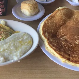 Grits, veggie omelette, biscuit and pancake