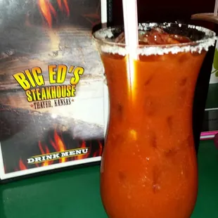 a glass of bloody drink