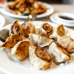 Pan-Fried Pork w/ Chinese Cabbage Dumplings ($16)