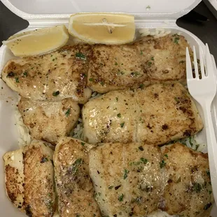 Pictured: Basa Swai Fish Grilled Over Rice w/ Garlic Butter