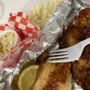 Grilled fish order with 2 sides