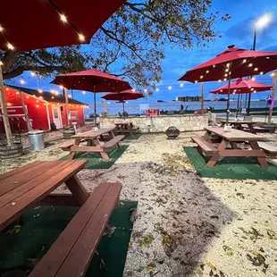 Outdoor seating.  Some games and stage up front.