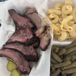 Brisket and pork rib plate: tasty smoky flavor to both. Brisket 4 stars, ribs 3.5