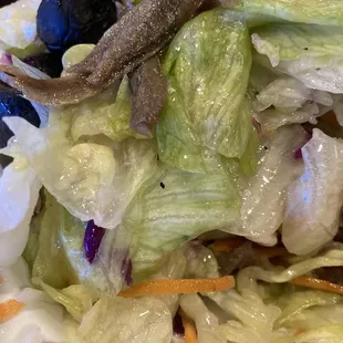 Signature salad with house dressing and anchovies (per request)