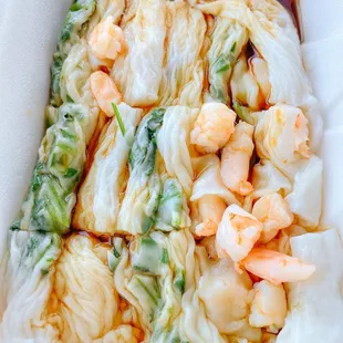 a dish of noodles and shrimp