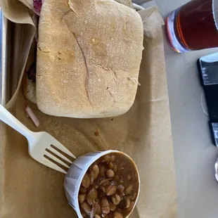 Pork belly sandwich and tiny beans lol