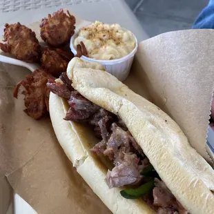 Philly and tots and Mac n cheese. $3.15 for that Mac‍‍