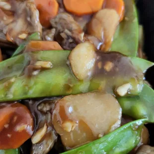 a stir fry of vegetables and meat