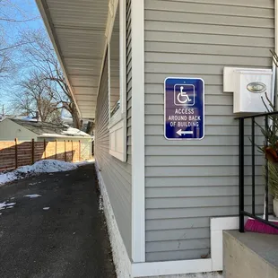 Sign to handicap access entry.