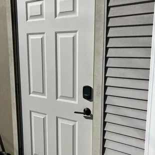 Handicap access door. Door bell above the handle to let you in.