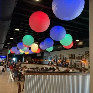 ows colorful paper lanterns hanging from the ceiling