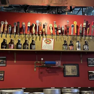  a wall of beer taps