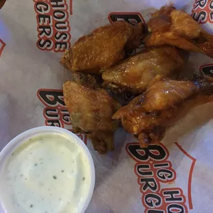 Hot bone-in wings with a side of ranch!