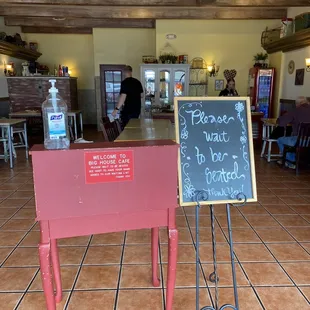 a table with a chalkboard sign