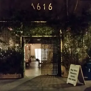 Entrance on the side of the building! Theatre is the first door on you right. :D