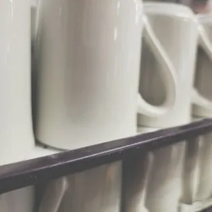 a row of coffee mugs