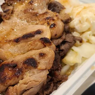 a meal in a styrofoam container