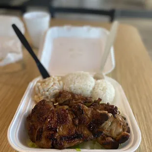 a meal in a styrofoam container